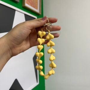 Llavero amarillo corazones