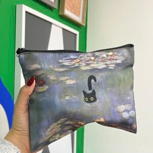 Cosmetiquera con diseño de gato negro