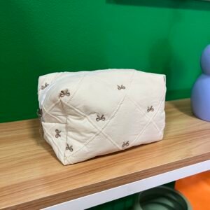 Cosmetiquera lazos beige
